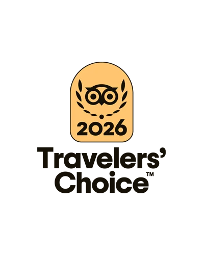 Award badge: orange rounded rectangle with an owl inside a laurel wreath and the year 2026.