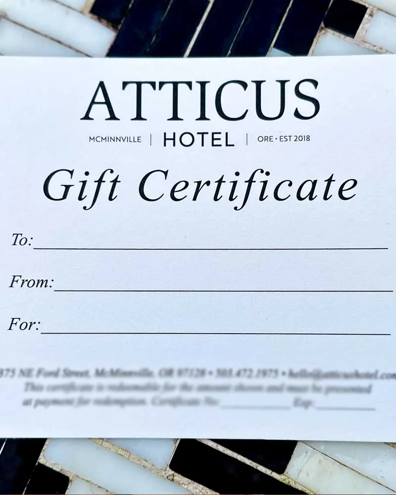 Atticus Hotel gift certificate with fields for To, From, and For on a white card