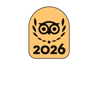 Travelers-Choice-Best-of-Best Gold badge with a black owl logo inside a laurel and the year 2026.